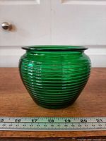 Frontal view showing overall shape, ribbed pattern, width scale