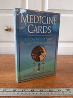 Front view of sealed Medicine Cards boxed set