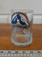 Front view of mug with scale, showing full decal and size