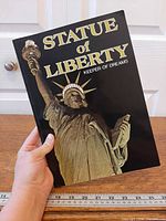 Front cover showing title and Statue of Liberty image