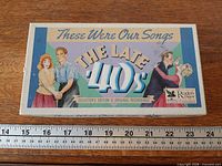 front of boxed cassette set with title and artwork