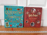 Front covers of both hardcover books showing titles and artwork