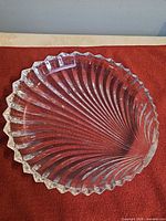 oblique view of bowl showing swirl ribbing and scalloped rim