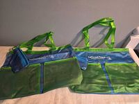Two LeGrow's Travel blue/green vinyl tote bags with wristlet pouches