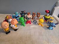 All 15 character figures displayed on tabletop