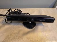 Front view showing three lenses and Xbox 360 logo