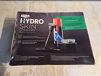 Front of boxed Schick Hydro Skin Comfort gift set