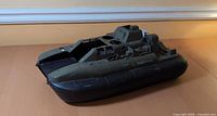 Top three-quarter view of GI Joe hovercraft showing deck layout and missing parts