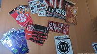 All sticker and tattoo packs spread on table