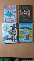 Front covers of the four DVDs