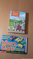 Both boxed games together for overview