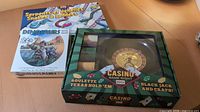Casino Game Night boxed set, Snakes & Ladders board, Dinosaurs puzzle box