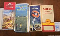 Group of five assorted maps: Esso Northern Scotland, British Columbia, Gulf Info-Map, Shell North Carolina / South Carolina and stack beneath
