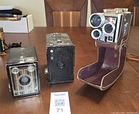 All three Kodak Brownie cameras side by side on table