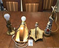 All four lamps and cords visible on tabletop