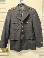 Full front view of coat on hanger