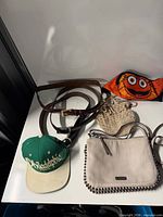 Overview of all items: bag, cap, two belts, crochet pouch, face mask