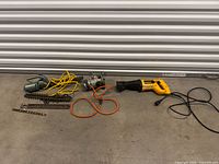 Group view of all tools and blades on floor