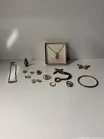 Overview of all jewelry pieces laid out, showing quantity and variety