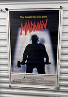 Full view of Madman poster showing artwork, title, tagline and credits