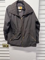 Front view of jacket hanging; shows overall design and color