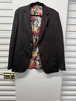 Full frontal view of blazer on hanger