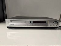 Front and top view of Oritron DAV2100 player