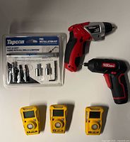 Overview of all items: Tapcon kit, two Tough cordless tools, three BW Clip detectors