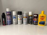 Front view of nine containers showing all brands and product names