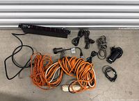 Group shot showing power center, orange and black cords
