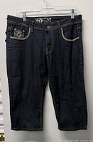 Full view of front of denim capri jeans