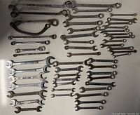 All wrenches spread out showing variety and size range