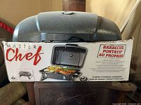 Box front showing Master Chef branding and grill image