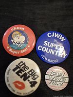 Front view of all four radio station buttons