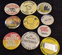 Front view of all ten Manitoba promotional buttons