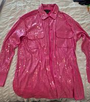 Front view of pink sequin Rachel Zoe shirt