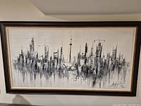 Full view of framed Toronto skyline painting