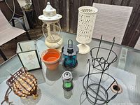 Group shot of all patio decor items on glass table
