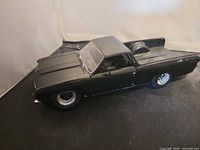 Left front view of black 1967 Chevy El Camino die-cast model