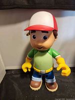 Front view of Handy Manny figure standing upright