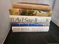 Stacked view of all five book spines