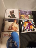 All five CDs arranged showing front cover artwork