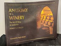 Front cover showing title, author, foreword credit and wine barrel image