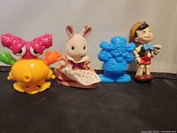 Group shot of all four figurines
