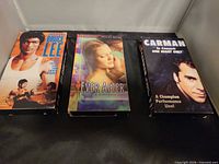 Front covers of the three VHS tapes