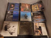 Overall view of nine CD cases arranged in three-by-three grid