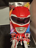 Front view of packaged Red Ranger figure showing product name and condition