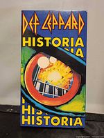 Front of Def Leppard Historia VHS slipcase