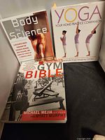 Front covers of all three books displayed upright