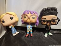 Group shot of three Funko Pop Runaways figures